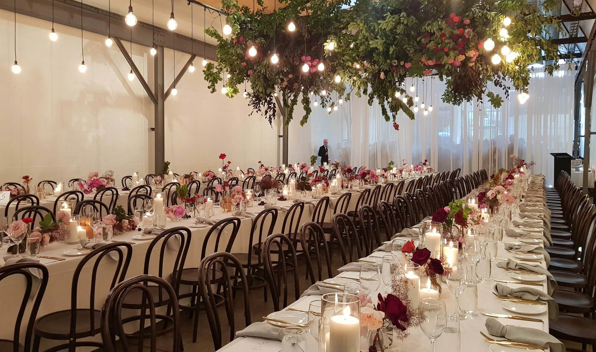 Wedding reception seating and floral installation.